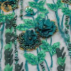 O bordado floral solúvel em água delicado da tela do laço ata o material para o vestido de casamento